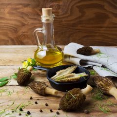 Black morel mushrooms in skillet